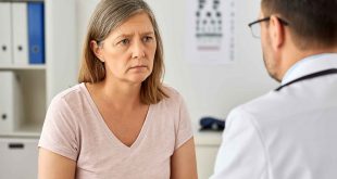 Middle-aged woman talking to her doctor about prediabetes risk factors