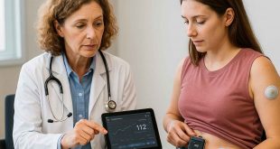 Doctor and patient reviewing Type 1 diabetes tech and CGM data