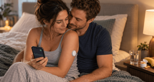 Adult couple reviewing continuous glucose monitor data while managing type 1 diabetes and concerns about hypoglycemia during intimacy.