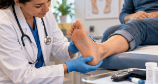 Healthcare professional examining a patient's foot during a type 1 diabetes foot screening to assess neuropathy, circulation, and diabetic foot complications.